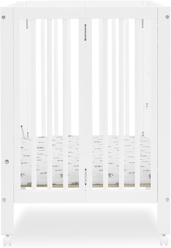 Delta Children Mia Portable Folding Mini Crib with 1.5-Inch Mattress - Greenguard Gold Certified, Bianca White - LeafyLoom