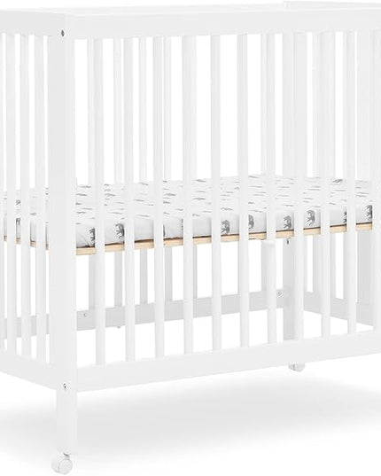 Delta Children Mia Portable Folding Mini Crib with 1.5-Inch Mattress - Greenguard Gold Certified, Bianca White - LeafyLoom
