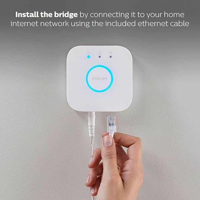 Philips Hue Smart Light Starter Kit - Includes (1) Bridge, (1) Smart Button and (3) Smart 75W A19 LED Bulbs - White and Color Ambiance - 1100LM - E26 - Control with Hue App or Voice Assistant PhilipsHue