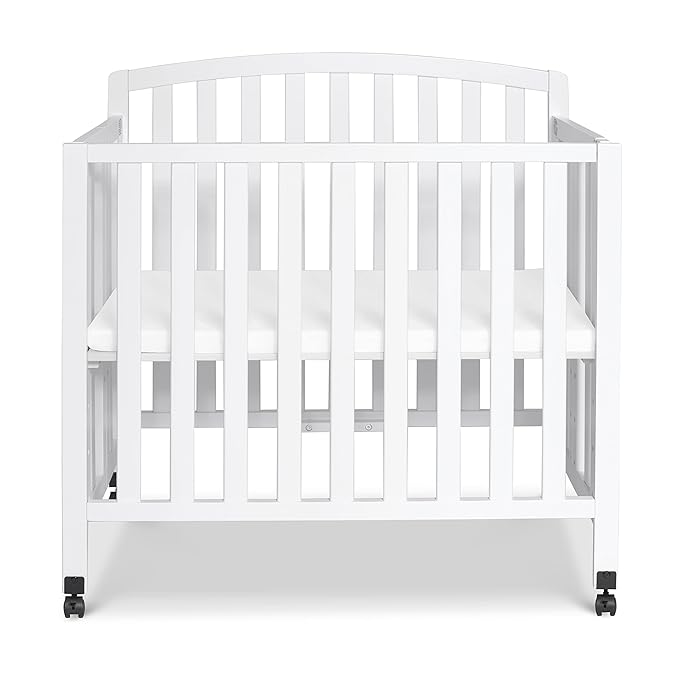 DaVinci Dylan Folding Portable 3-in-1 Convertible Mini Crib and Twin Bed in White, Greenguard Gold Certified - LeafyLoom