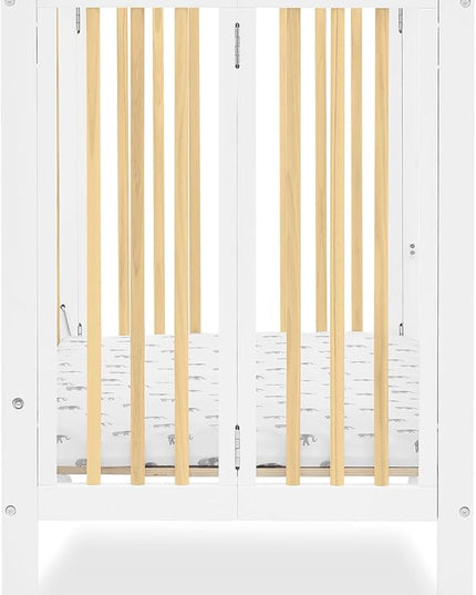 Delta Children Mia Portable Folding Mini Crib with 1.5-Inch Mattress - Greenguard Gold Certified, Bianca White/Natural - LeafyLoom