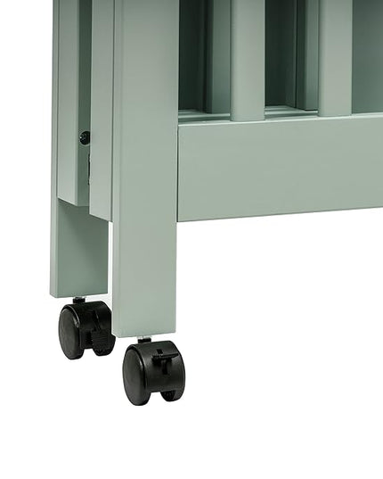 Babyletto Origami Mini Portable Crib Folding with Wheels in Light Sage, 2 Adjustable Mattress Positions, Greenguard Gold Certified - LeafyLoom