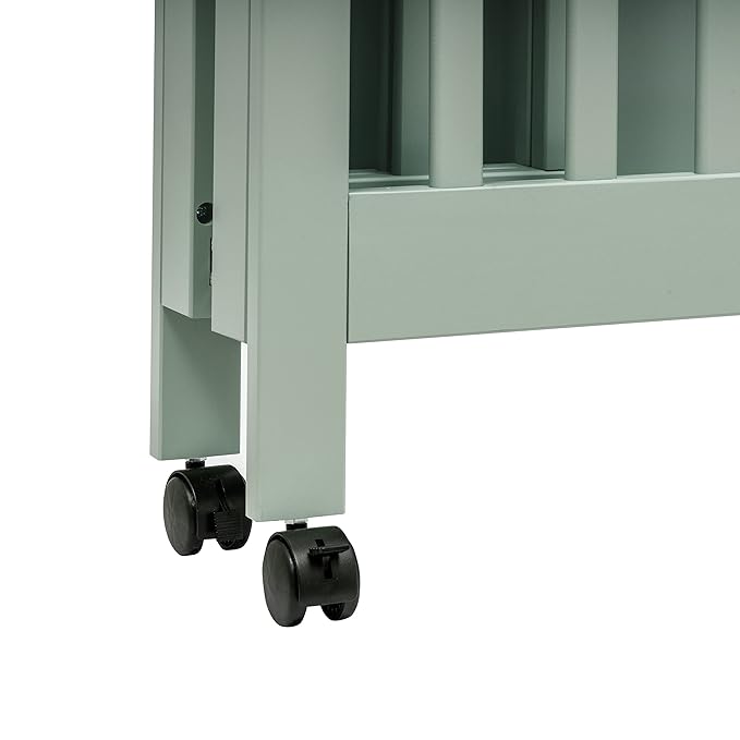 Babyletto Origami Mini Portable Crib Folding with Wheels in Light Sage, 2 Adjustable Mattress Positions, Greenguard Gold Certified - LeafyLoom