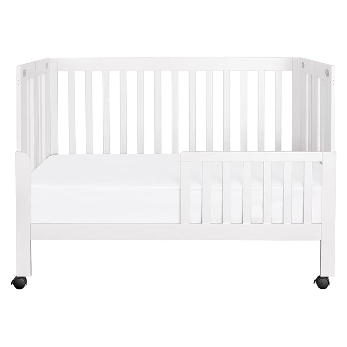 Babyletto Maki Full-Size 2-in-1 Portable Folding Crib with Toddler Bed Conversion Kit in White, Greenguard Gold Certified - LeafyLoom