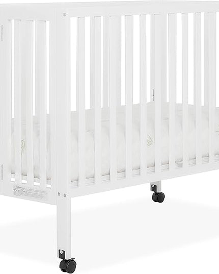 Quinn Full-Size Folding Crib In White, Removeable Wheels, Modern Nursey, Adjustable Mattress Support, Portable Crib, Patented Folding System - LeafyLoom