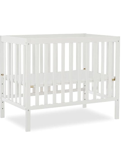 Edgewood 4-In-1 Convertible Mini Crib In White, JPMA Certified, Non-Toxic Finish, New Zealand Pinewood, With 3 Mattress Height Settings, Included 1" Mattress Pad - LeafyLoom
