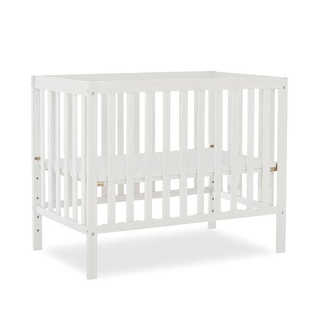 Edgewood 4-In-1 Convertible Mini Crib In White, JPMA Certified, Non-Toxic Finish, New Zealand Pinewood, With 3 Mattress Height Settings, Included 1" Mattress Pad - LeafyLoom