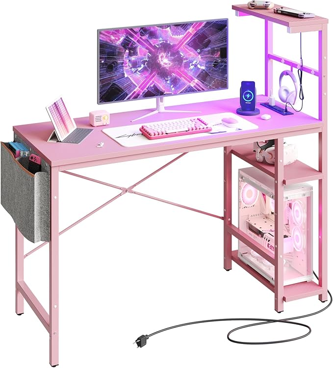 Bestier Pink Gaming Desk with Power Outlets, 44 Inch Led Gamer Desk with 4 Tiers Reversible Shelves, Pink Computer Desk with Headset Hook & Side Storage Bag for Bedroom (Pink 3D Carbon Fiber) - LeafyLoom
