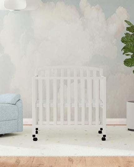 DaVinci Dylan Folding Portable 3-in-1 Convertible Mini Crib and Twin Bed in White, Greenguard Gold Certified - LeafyLoom