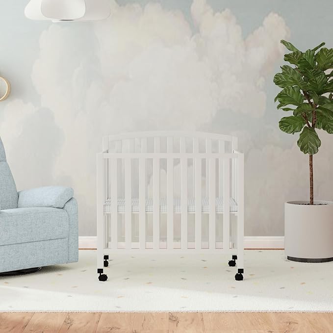 DaVinci Dylan Folding Portable 3-in-1 Convertible Mini Crib and Twin Bed in White, Greenguard Gold Certified - LeafyLoom