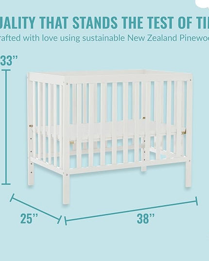 Edgewood 4-In-1 Convertible Mini Crib In White, JPMA Certified, Non-Toxic Finish, New Zealand Pinewood, With 3 Mattress Height Settings, Included 1" Mattress Pad - LeafyLoom