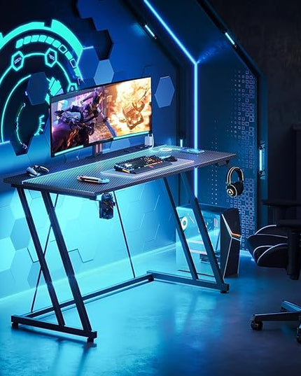MOTPK Gaming Desk with LED Lights & Power Outlet, Computer Desk 47inch for Small Space, Cheap Gaming Table with Carbon Fiber Texture, Kids Desk Gift for Boys Men, Black - LeafyLoom