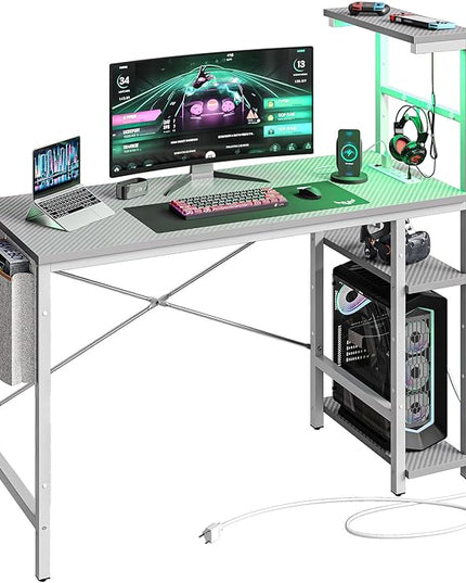 Bestier Gaming Desk with Power Outlets, 44 Inch Led Gamer Desk with 4 Tiers Reversible Shelves, PC Gaming Table with Headset Hook & Side Storage Bag for Bedroom (Grey 3D Carbon Fiber) - LeafyLoom