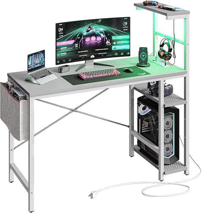 Bestier Gaming Desk with Power Outlets, 44 Inch Led Gamer Desk with 4 Tiers Reversible Shelves, PC Gaming Table with Headset Hook & Side Storage Bag for Bedroom (Grey 3D Carbon Fiber) - LeafyLoom