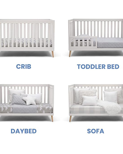 Delta Children Essex 4-in-1 Convertible Baby Crib, Bianca White with Natural Legs - LeafyLoom