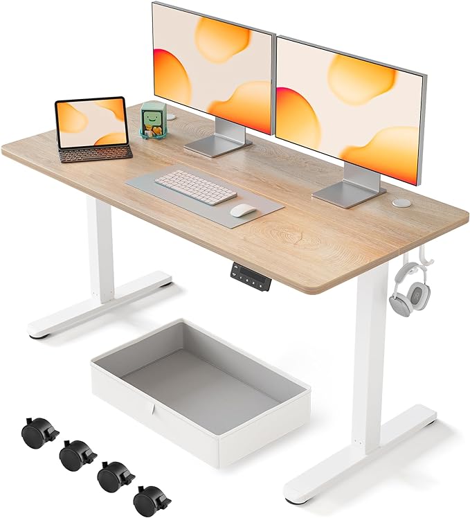 FEZIBO 55 x 24 Inches Standing Desk with Drawer, Adjustable Height Electric Stand up Desk with Storage, Sit Stand Home Office Desk, Ergonomic Computer Desk, Maple - LeafyLoom