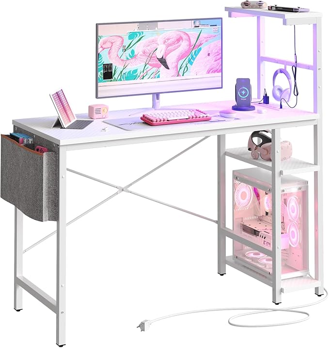 Bestier Gaming Desk with Power Outlets, 44 Inch Led Gamer Desk with 4 Tiers Reversible Shelves, PC Gaming Table with Headset Hook & Side Storage Bag for Bedroom (White 3D Carbon Fiber) - LeafyLoom