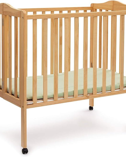 Delta Children Folding Portable Mini Baby Crib with 1.5-inch Mattress - Greenguard Gold Certified, Natural - LeafyLoom
