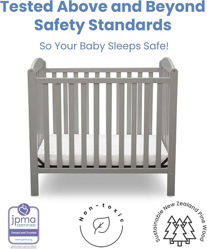 Delta Children Emery Mini Convertible Baby Crib with 2.75-inch Mattress, Grey - LeafyLoom