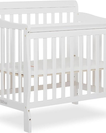 Aden 4-in-1 Convertible Mini Crib In White, Greenguard Gold Certified, Non-Toxic Finish, New Zealand Pinewood, With 3 Mattress Height Settings - LeafyLoom