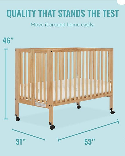Quinn Full-Size Folding Crib in Natural, Removeable Wheels, Modern Nursey, Adjustable Mattress Support, Portable Crib, Patented Folding System - LeafyLoom