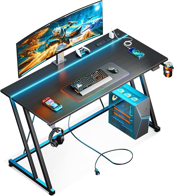 MOTPK Gaming Desk with LED Lights & Power Outlet, Computer Desk 47inch for Small Space, Cheap Gaming Table with Carbon Fiber Texture, Kids Desk Gift for Boys Men, Black - LeafyLoom