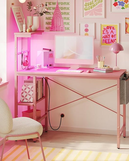 Bestier Pink Gaming Desk with Power Outlets, 44 Inch Led Gamer Desk with 4 Tiers Reversible Shelves, Pink Computer Desk with Headset Hook & Side Storage Bag for Bedroom (Pink 3D Carbon Fiber) - LeafyLoom