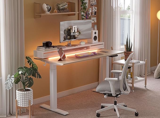 FEZIBO 55 × 26 Inch Electric Standing Desk with Monitor Stand, Height Adjustable Table with LED Strips, Ergonomic Home Office Desk with 2 Drawers Storage Gaming Workstation, Light Walnut - LeafyLoom