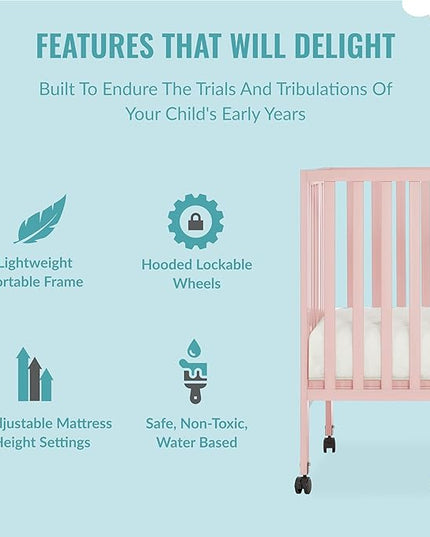 Quinn Full-Size Folding Crib in Blush Pink, Removeable Wheels, Modern Nursey, Adjustable Mattress Support, Portable Crib, Patented Folding System - LeafyLoom