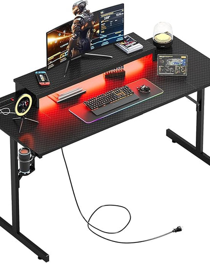 Bestier 52 inch Gaming Desk with Power Outlets and USB Charging Ports, Sturdy Computer Desk with LED Lights and Monitor Stand, Computer Table for Home Office, Easy to Assemble, Carbon Fiber Black - LeafyLoom