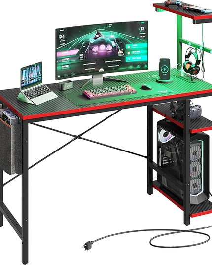 Bestier Gaming Desk with Power Outlets, 44 Inch Led Gamer Desk with 4 Tiers Reversible Shelves, PC Gaming Table with Headset Hook & Side Storage Bag for Bedroom (Black 3D Carbon Fiber) - LeafyLoom