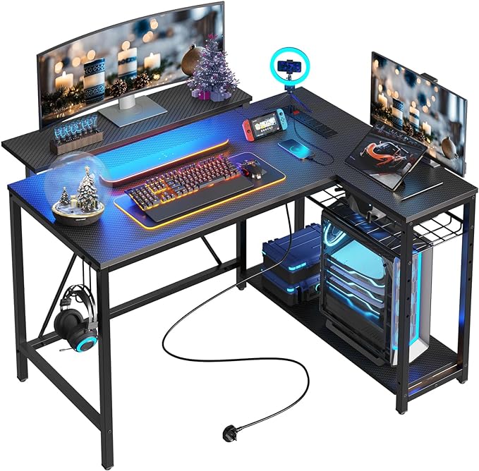 Bestier Small Gaming Desk with Power Outlets,42 L Shaped LED Computer Desk with Stand Reversible Shelves,Corner Gamer Desk with Headset Hooks USB Charging Port,Carbon Fiber Black - LeafyLoom