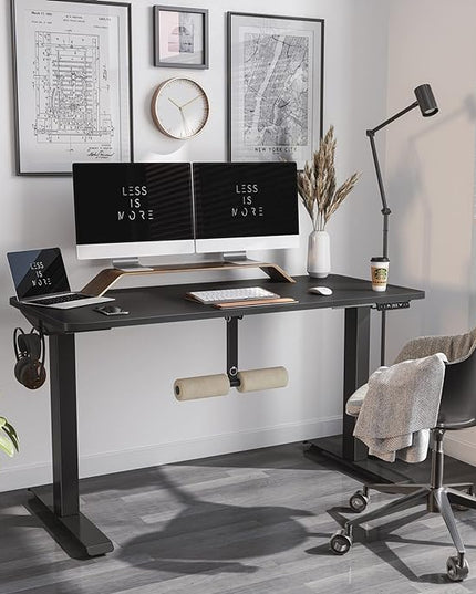 FAMISKY 55 Inch Height Adjustable Standing Desk with Foot Rest, Sit Stand Home Office Desk with Hooks, Ergonomic Workstation Black Steel Frame/Black Wood Top - LeafyLoom