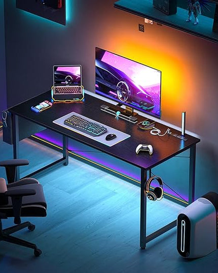 AODK 48 inch Small Computer Desk with Power Outlet for Small Spaces Home Office Student Laptop PC Writing Desks with Storage Bag Headphone Hook, Black - LeafyLoom