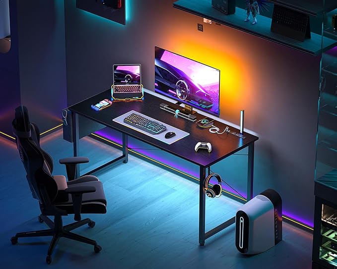 AODK 48 inch Small Computer Desk with Power Outlet for Small Spaces Home Office Student Laptop PC Writing Desks with Storage Bag Headphone Hook, Black - LeafyLoom