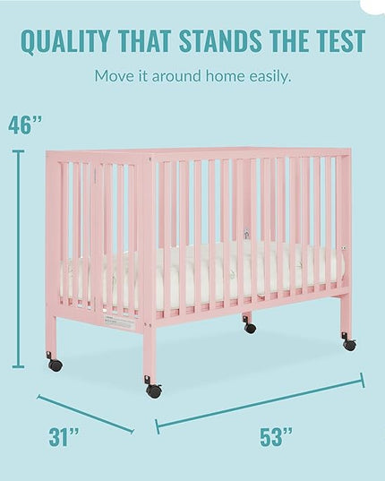 Quinn Full-Size Folding Crib in Blush Pink, Removeable Wheels, Modern Nursey, Adjustable Mattress Support, Portable Crib, Patented Folding System - LeafyLoom