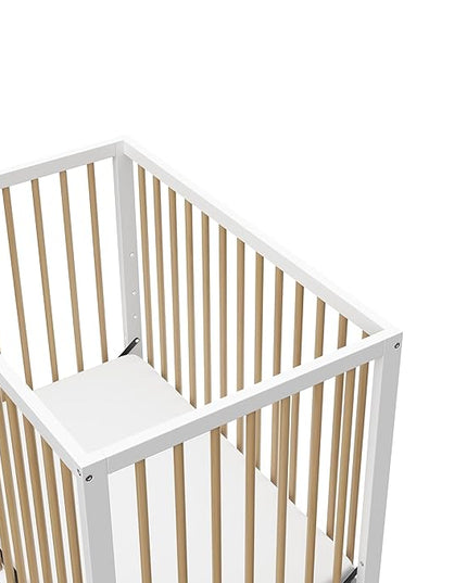 Graco Teddi 4-in-1 Convertible Mini Crib with Bonus Water-Resistant Mattress (White with Driftwood) – GREENGUARD Gold Certified, 2.75-Inch Mattress Included, Convenient Size, Easy 30-Minute Assembly - LeafyLoom
