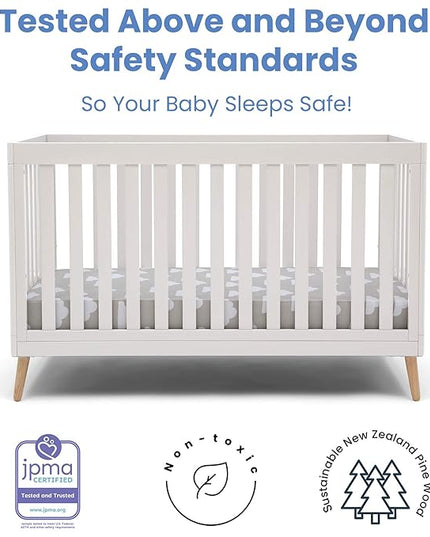 Delta Children Essex 4-in-1 Convertible Baby Crib, Bianca White with Natural Legs + Delta Children Twinkle Galaxy Dual Sided Recycled Fiber Core Crib and Toddler Mattress (Bundle) - LeafyLoom
