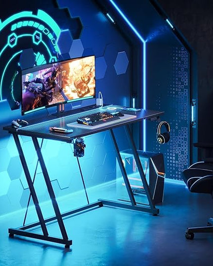 MOTPK Small Gaming Desk with LED Lights & Power Outlet, Computer Desk 39inch for Small Space, Cheap Gaming Table with Carbon Fiber Texture, Kids Desk Gift for Boys Men, Black - LeafyLoom