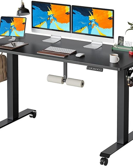 FAMISKY 55 Inch Height Adjustable Standing Desk with Foot Rest, Sit Stand Home Office Desk with Hooks, Ergonomic Workstation Black Steel Frame/Black Wood Top - LeafyLoom
