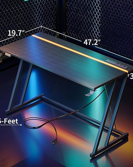 MOTPK Gaming Desk with LED Lights & Power Outlet, Computer Desk 47inch for Small Space, Cheap Gaming Table with Carbon Fiber Texture, Kids Desk Gift for Boys Men, Black - LeafyLoom