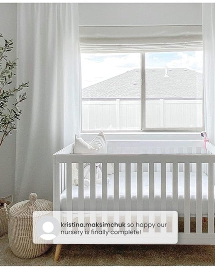 Delta Children Essex 4-in-1 Convertible Baby Crib, Bianca White with Natural Legs - LeafyLoom