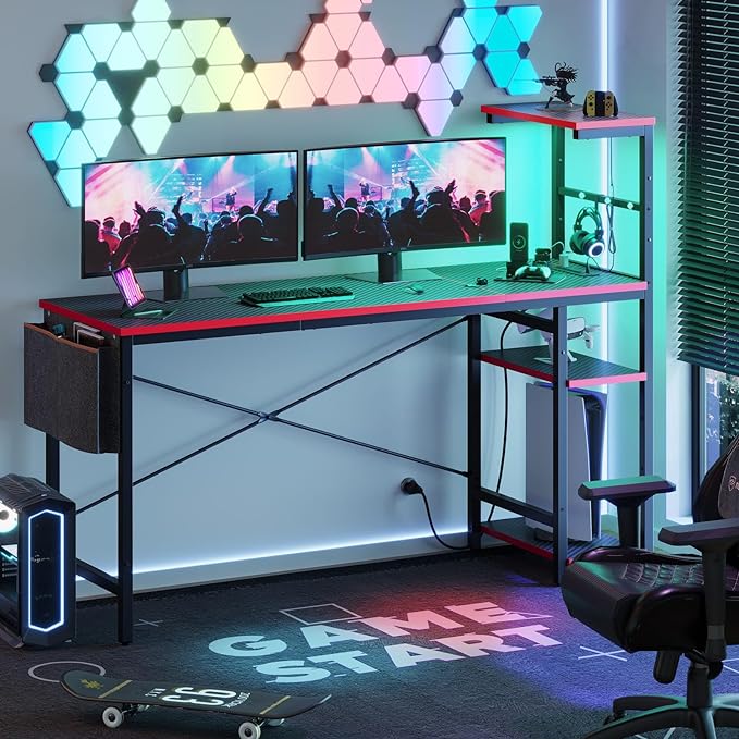 Bestier Gaming Desk with Power Outlets, 61 Inch Large Led Gamer Desk with 4 Tiers Reversible Shelves, PC Gaming Table with Headset Hook & Side Storage Bag for Bedroom (Black 3D Carbon Fiber) - LeafyLoom
