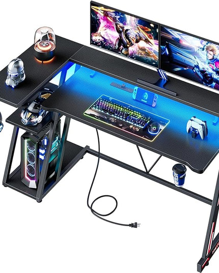 Computer Gaming Desk with Power Outlet & LED Lights, 55 Inch L Shaped Gamer Table with Storage Shelves for Bedroom, Reversible Corner Home Office Desk, Carbon Fiber Black - LeafyLoom