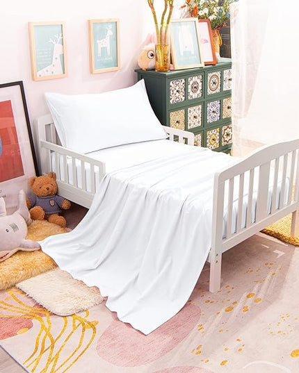 NTBAY Toddler Bedding Set - 4 Piece Soft and Breathable Crib Bedding Set for Boys and Girls, Includes Quilted Comforter, Fitted Sheet, Flat Top Sheet and Envelope Pillowcase, White - LeafyLoom