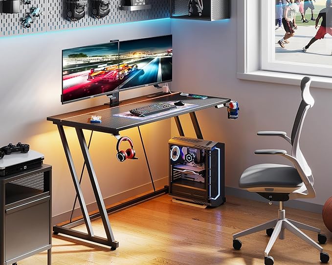 MOTPK Gaming Desk with LED Lights & Power Outlet, Computer Desk 47inch for Small Space, Cheap Gaming Table with Carbon Fiber Texture, Kids Desk Gift for Boys Men, Black - LeafyLoom
