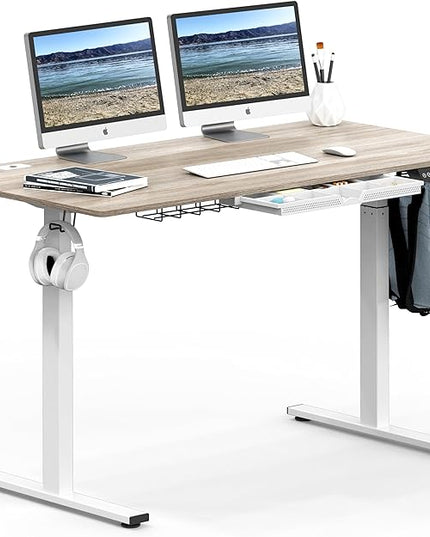 SHW 55-Inch Large Electric Height Adjustable Standing Desk, 55 x 28 Inches, Maple - LeafyLoom