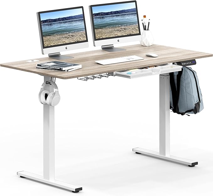 SHW 55-Inch Large Electric Height Adjustable Standing Desk, 55 x 28 Inches, Maple - LeafyLoom