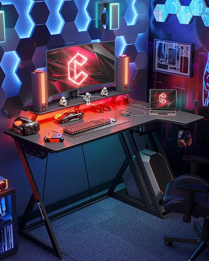 CubiCubi Aurora Gaming Desk with LED Lights & Power Outlets, 40 Inch L Shaped Carbon Fiber Surface Desk with Storage Shelves, Small Corner Computer Desk with Monitor Shelf, Gamer Desk PC Table, Black - LeafyLoom
