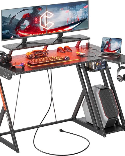 CubiCubi Aurora Gaming Desk with LED Lights & Power Outlets, 40 Inch L Shaped Carbon Fiber Surface Desk with Storage Shelves, Small Corner Computer Desk with Monitor Shelf, Gamer Desk PC Table, Black - LeafyLoom